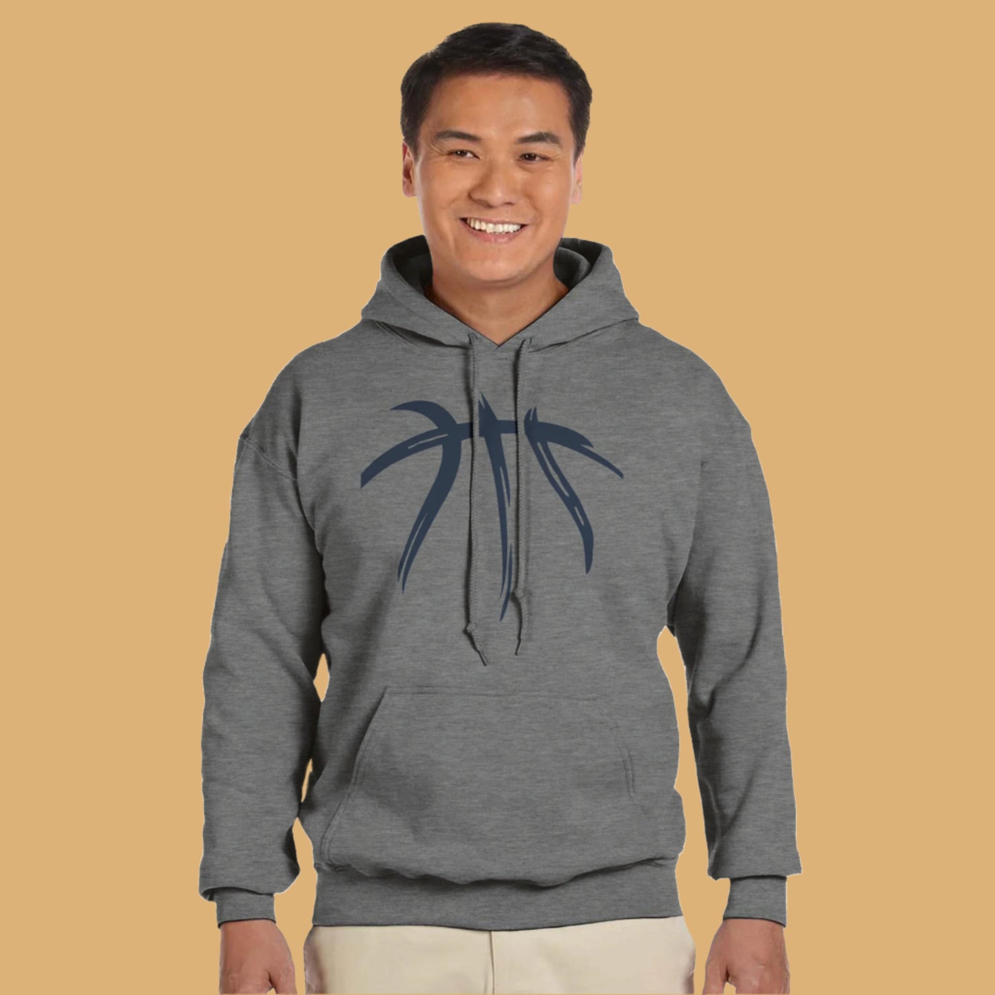 Person wearing a gray hoodie with a black design on a white background