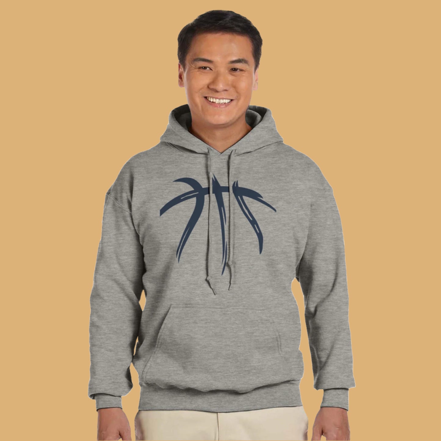 Person wearing a gray hoodie with a black design on a white background