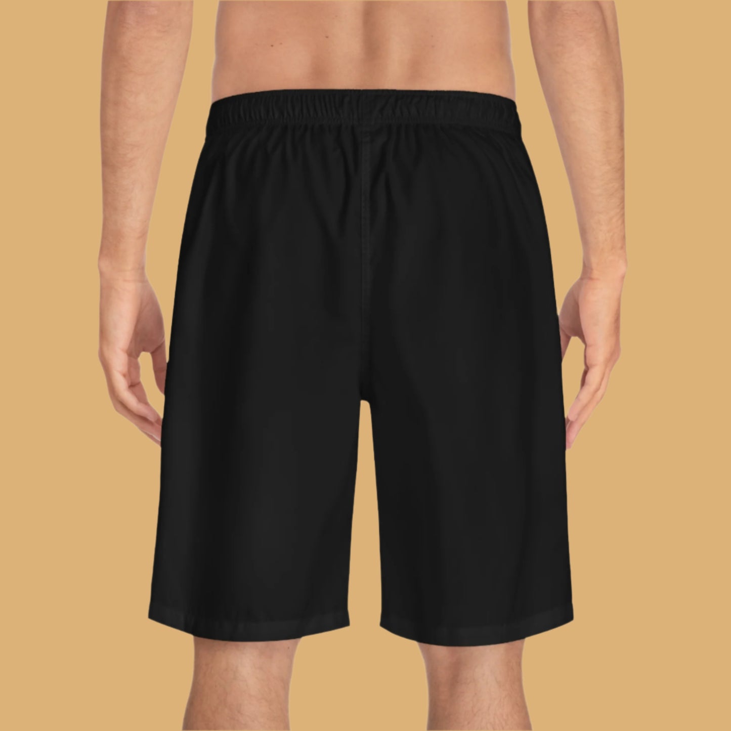 Black shorts worn by a person on a white background