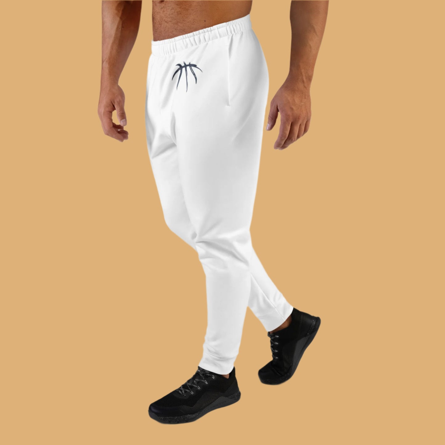White jogger pants worn by a person on a beige background