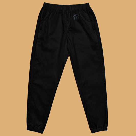 Black pants on a beige background