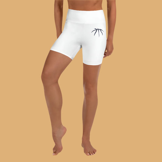 White athletic shorts with a logo on a white background