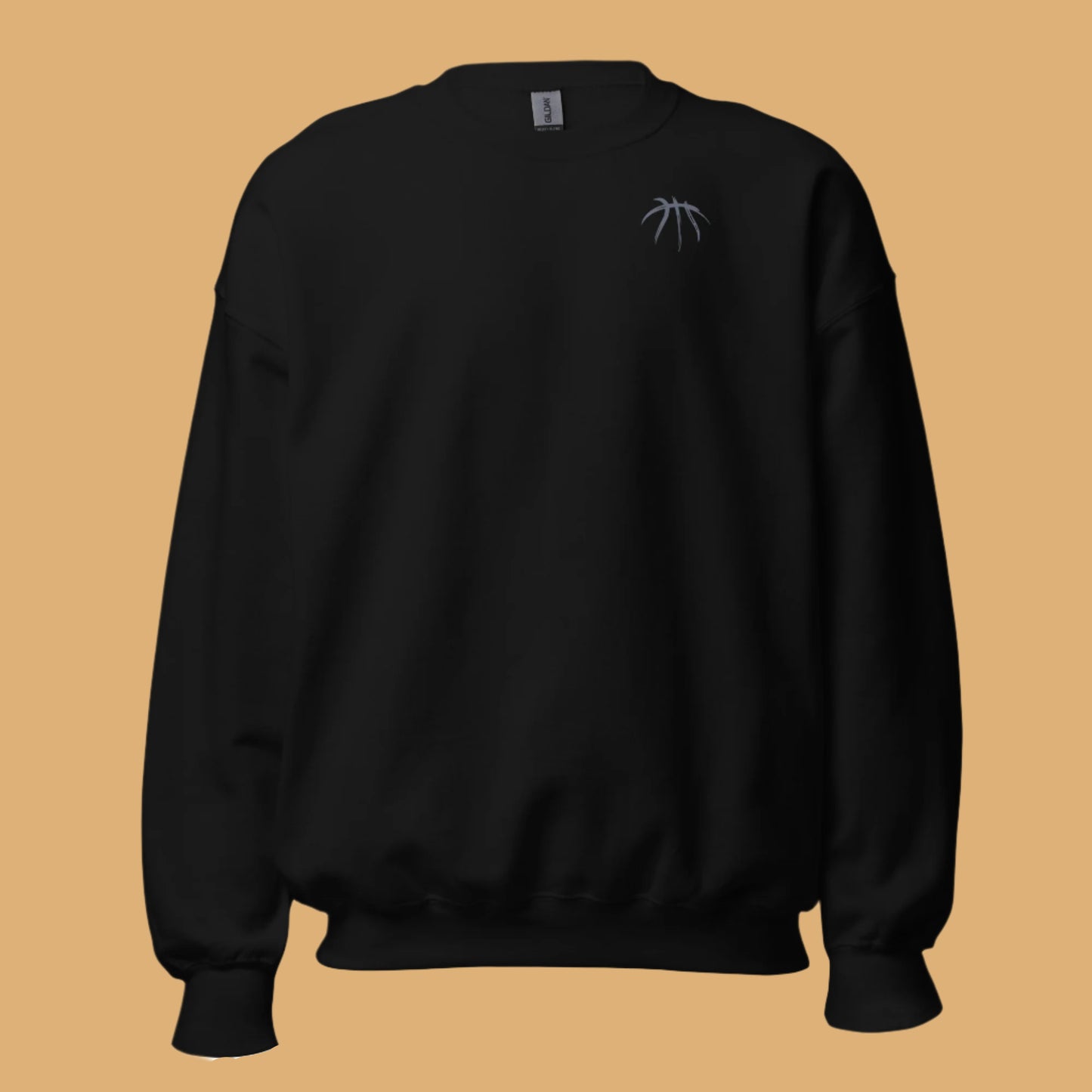 Black sweatshirt with a small logo on a beige background