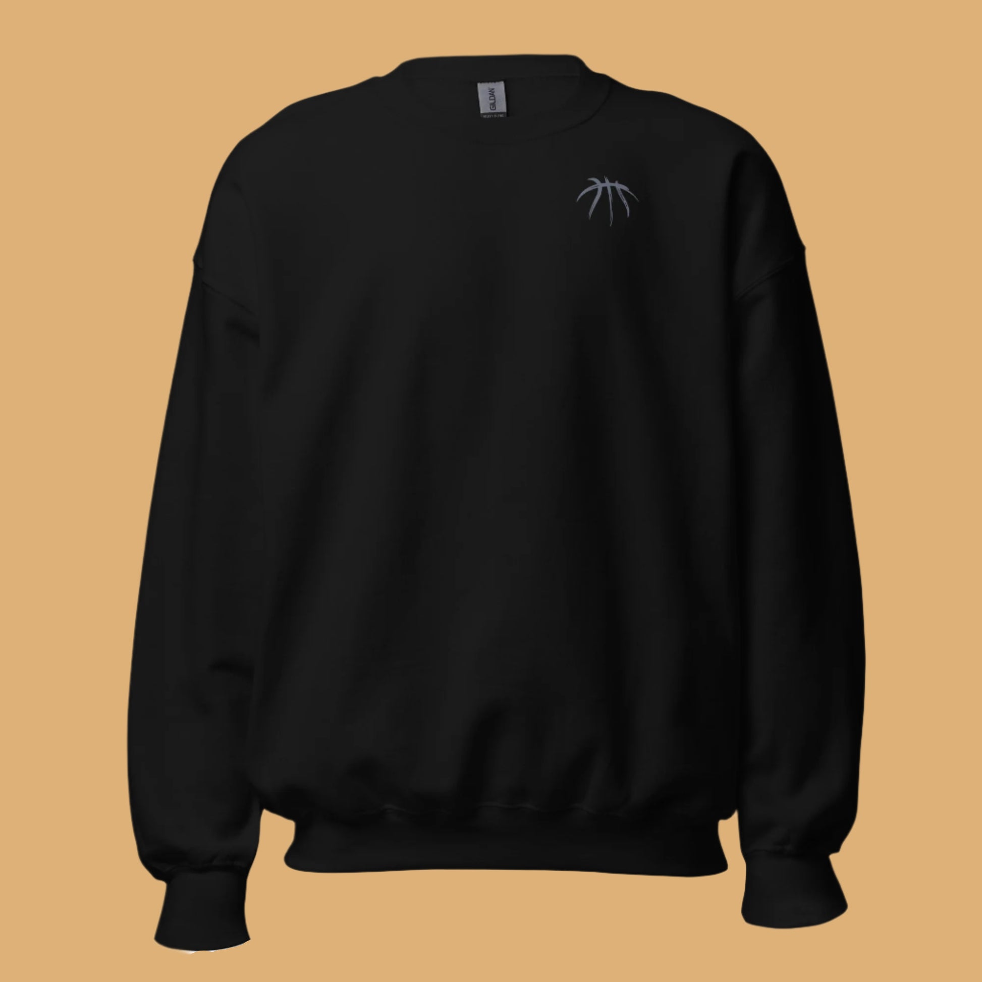 Black sweatshirt with a small logo on a beige background