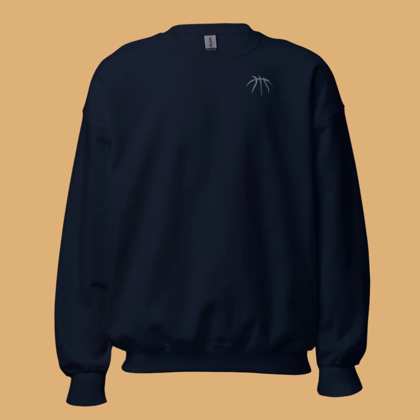 Black sweatshirt with a small logo on a beige background