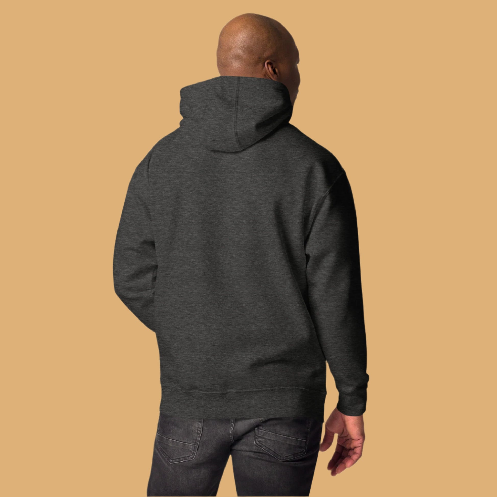 Person wearing a dark gray hoodie from behind on a white background